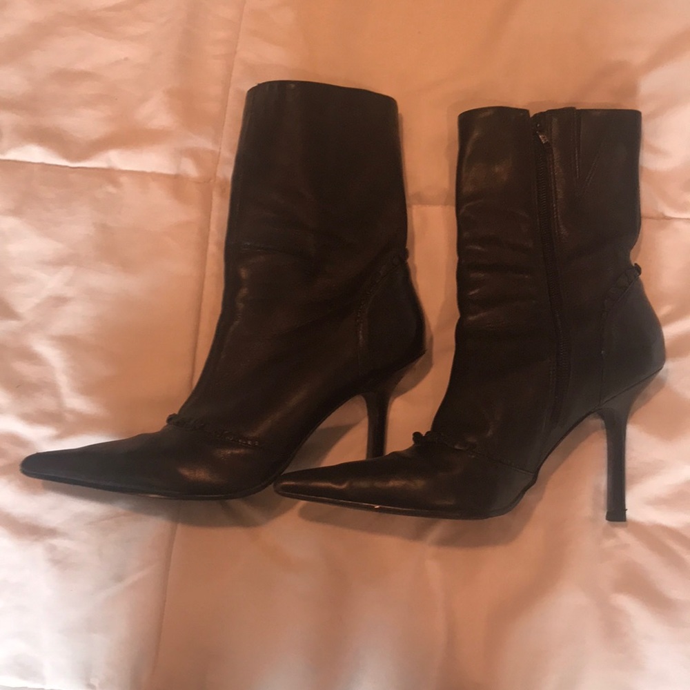 Black ankle ruffled heeled boots